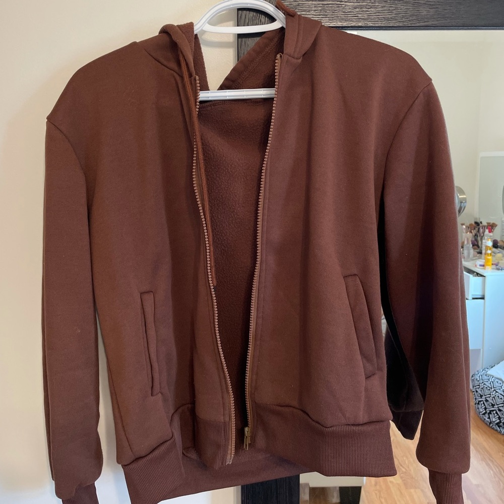 brown zip up sweater